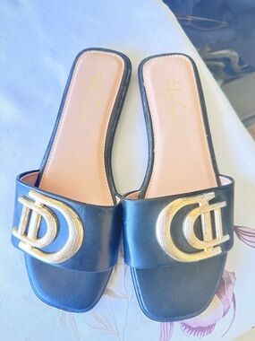 Sergio Todzi Black Slide Sandals with Gold Hardware - Women size 7
